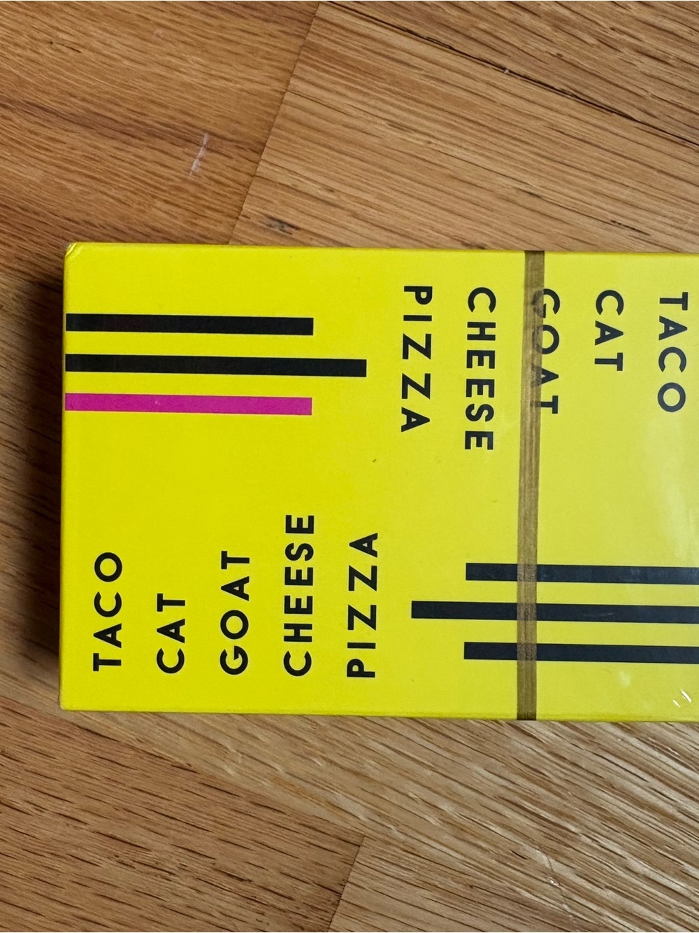 Taco Cat Goat Cheese Pizza Card Game - Bright Yellow Box